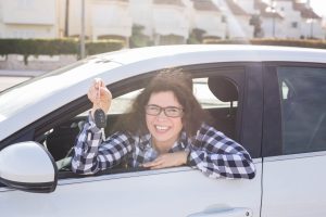 happy women with new car loan